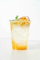 passion fruit mango mojito in glass photo