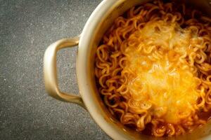 Korean spicy instant noodle with cheese photo