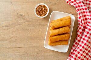 fried spring roll with sauce photo