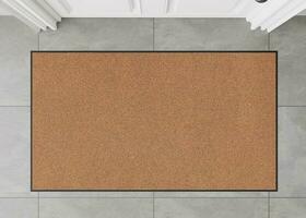 Blank brown door mat on the floor at home. Welcome mat with copy space for your text. Doormat mock up. Carpet at entrance for wiping dirty shoes. Mockup. 3D Rendering. photo