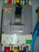 Voltage switchboard panel, electrical components at plant and factory with circuit breakers. photo