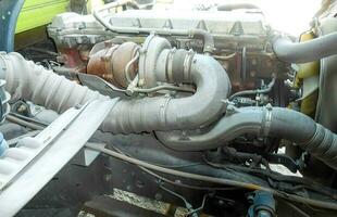 truck engine with copy space for text. Metallic background of the internal diesel truck engine photo