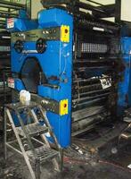 machines on a large printing plant factory, printing of books photo