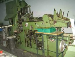 machines on a large printing plant factory, printing of books photo