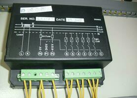 Voltage switchboard panel, electrical components at plant and factory with circuit breakers. photo