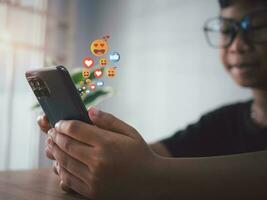 boy hand using smartphone typing live chat chatting on application communication digital web and social network concept. Social media application chat box. photo