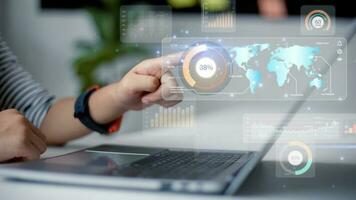 Data scientists.  a programmer using a laptop to analyze and develop various information on a futuristic virtual interface screen. Algorithm. marketing and deep learning of artificial intelligence photo