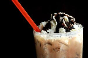 Float vanilla icecream on dark mocha smoothie photo