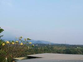 The view of the city of Kediri that can be seen from the hill is beautiful and calm photo