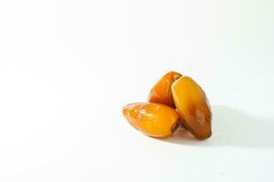 Fresh ripe yellow dates, fresh dates ruthob isolated on white background photo