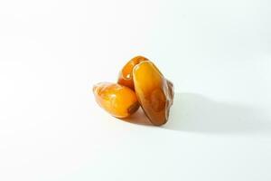 Fresh ripe yellow dates, fresh dates ruthob isolated on white background photo