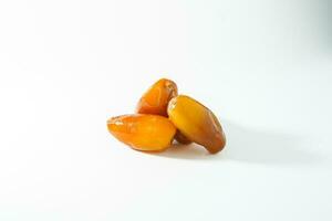 Fresh ripe yellow dates, fresh dates ruthob isolated on white background photo