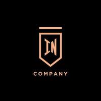 IN monogram initial with shield logo design icon vector