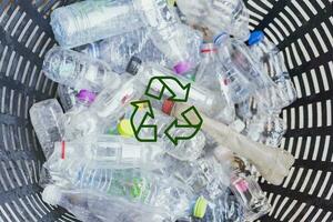 Plastic bottles in recycle trash station. photo