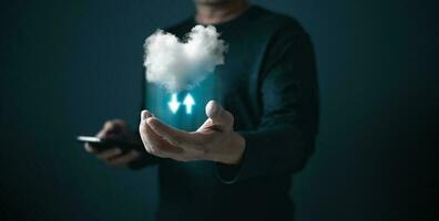 man hold cloud computing  system diagram show on hand.Data storage.Digital technology network service business in wireless storage concept. Implementing storage technology support in business. photo