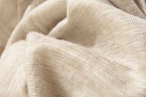Natural wool cream colored fabric. Cashmere, wool. Texture of natural wool fabric. Knitwear. photo
