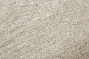 Cream colored cashmere fabric texture photo