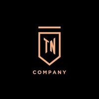 TN monogram initial with shield logo design icon vector