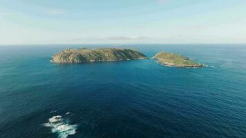 Sisargas Islands Surrounded By Calm Blue Sea In A Coruna, Galicia, Spain. - aerial video