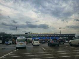 Cikampek, Indonesia in November 2022. The queue of cars that will enter the Cikampek Utama toll gate. photo