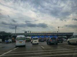 Cikampek, Indonesia in November 2022. The queue of cars that will enter the Cikampek Utama toll gate. photo