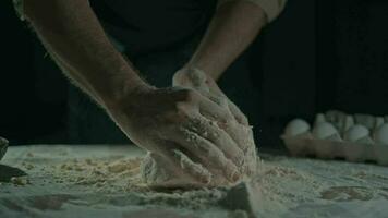 close up male hands kneading dough video