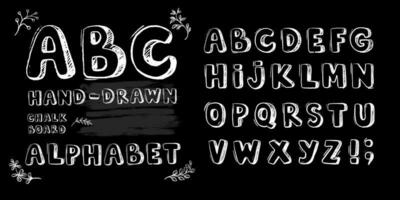 Font pencil vintage alphabet drawing with chalk on chalk board background. vector