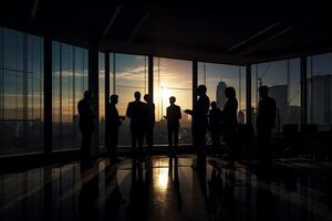 silhouette business people working at bright office with photo