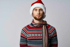 man in Christmas clothes holiday New Year Studio photo