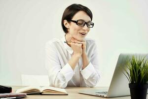 woman in costume in front of laptop with glasses self-confidence Studio Lifestyle photo
