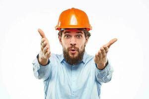 Engineer in orange coloring safety professionals construction emotions hand gestures photo