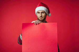 emotional man in a christmas red mockup poster isolated background photo