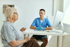 the patient sits in the doctor's office health care photo