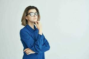 woman in blue shirt wearing glasses cropped view elegant style photo