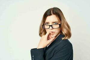 Business woman in black suit wearing glasses self confidence office photo