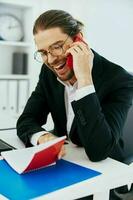 businessman work in the office in front of a laptop lifestyle photo