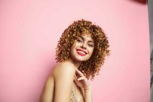 Charming model Red lips beautiful smile isolated background curly hair photo