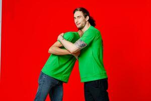 two friends greetings communication emotions red background photo