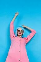 glamorous woman in sunglasses wears a blue wig makeup Lifestyle posing photo