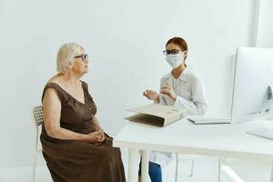 doctors in the medical office patient examination health care photo