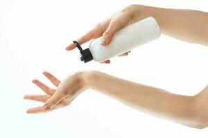 lotion in female hands moisturizing and skin care health photo