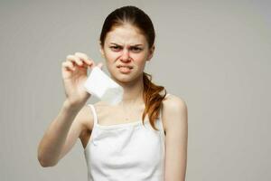 woman in white t-shirt with a scarf close-up photo