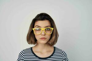 cheerful woman in sunglasses striped t-shirt red skirt photo