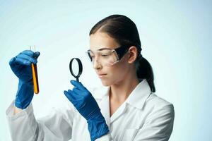 woman laboratory assistant diagnostics research science medicine analyzes photo