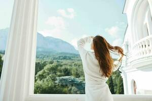 pretty woman hands up on the balcony Perfect sunny morning photo