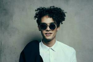 guy with curly hair teen classic suit sunglasses shirt photo