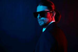 businessmen modern style suit fashion sunglasses dark background photo