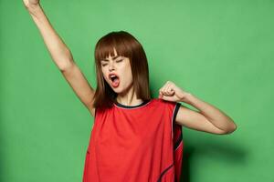 Cheerleader in a red T-shirt football team victory photo