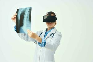 radiologist with virtual reality glasses x-ray technology photo