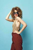 Cheerful woman Curly hair sunglasses fashion elegant style photo